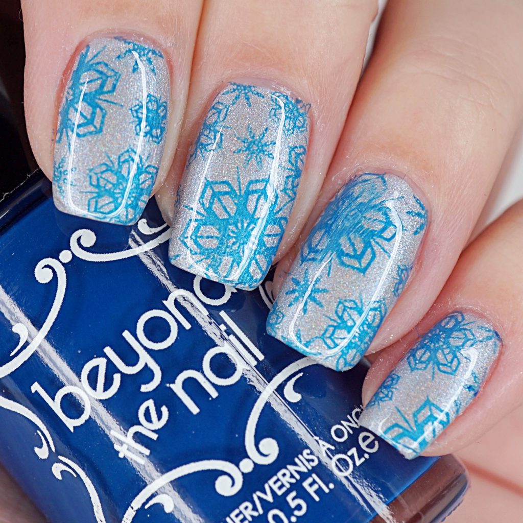 Blue Shimmer Snowflake Nails