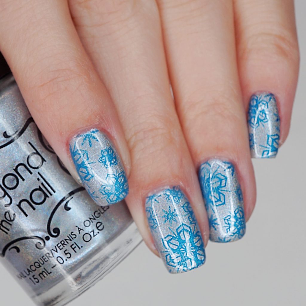 Blue Shimmer Snowflake Nails